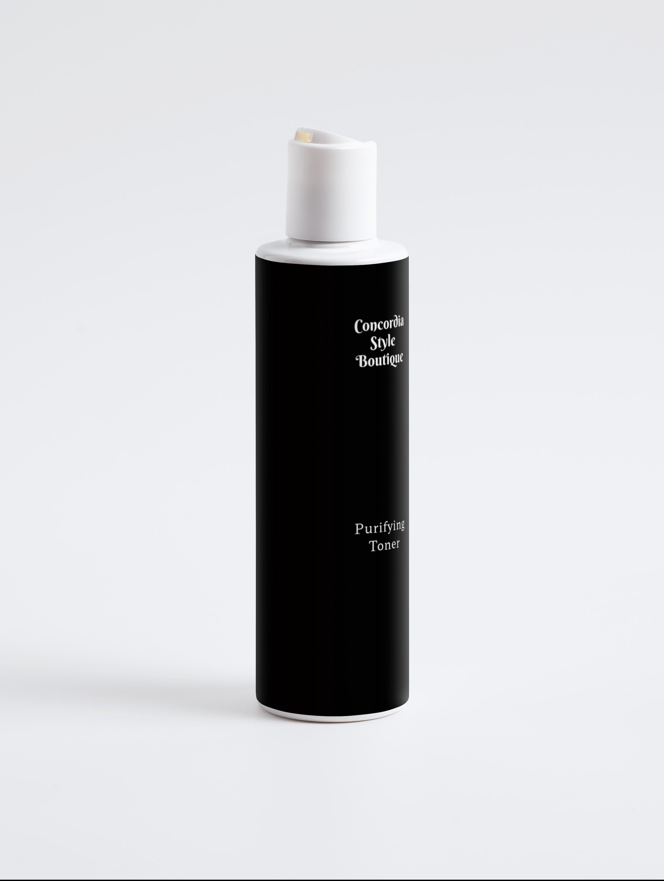 Purifying Toner bottle with lavender flower water and salicylic acid ingredients, designed for oily and mixed skin types.