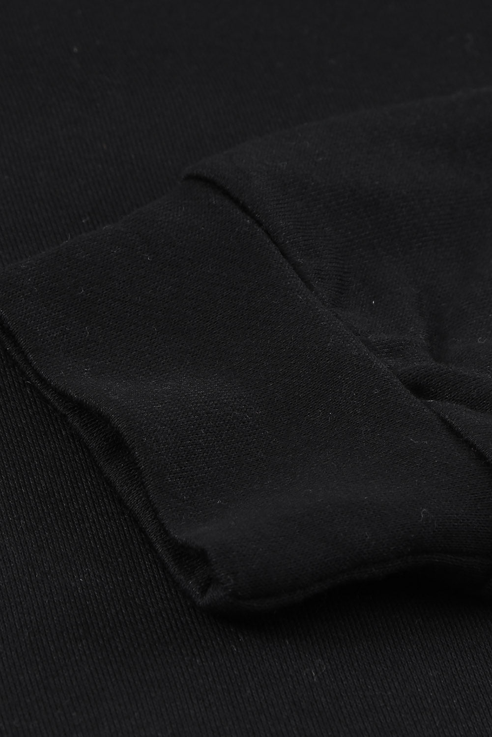 A stylish quilted patch half zipper sweatshirt in solid color, showcasing its unique texture and chic design.