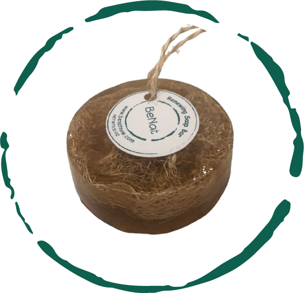 Renewing Soap Bar featuring chamomile, honey, and coconut oil with a natural loofah for gentle exfoliation.