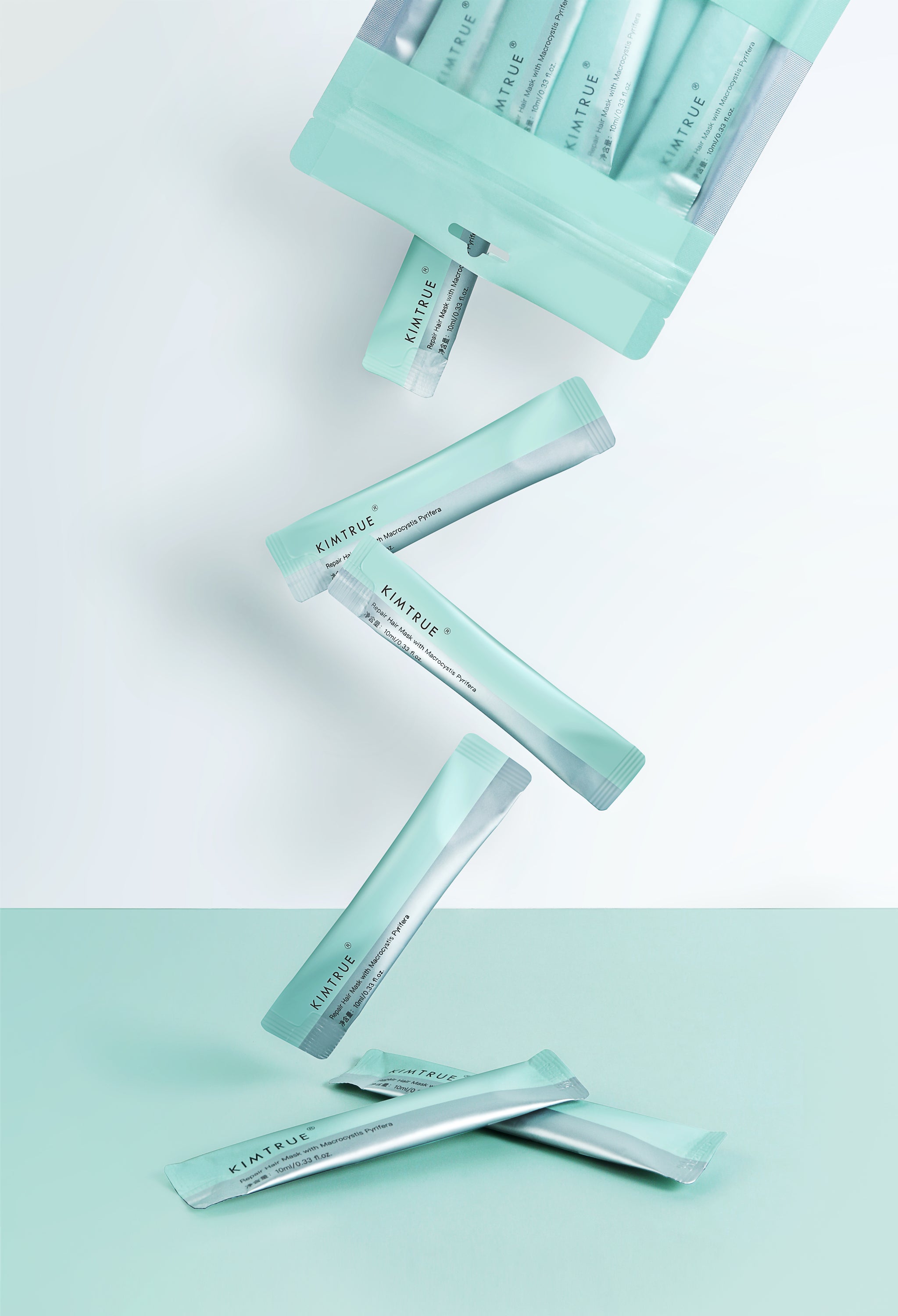 Kimtrue Repair Hair Mask with Macrocystis Pyrifera in individual 10ml sachets, designed for nourishing and repairing damaged hair.