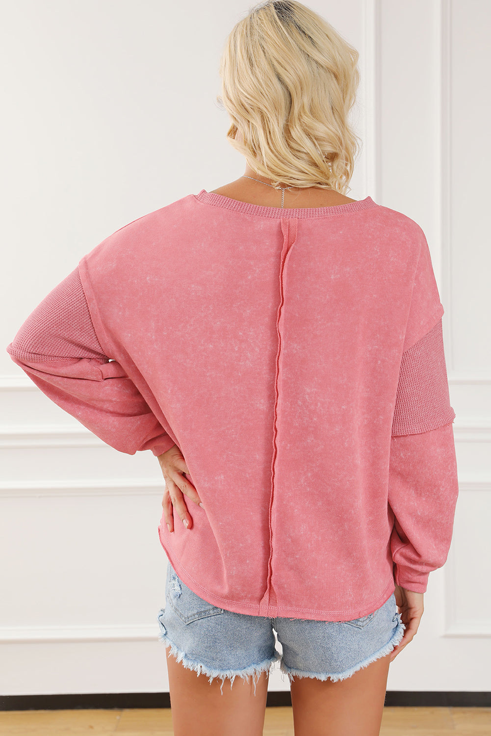 Rose Mineral Wash Patchwork Exposed Seam Sweatshirt featuring a retro design with exposed seams and a loose fit, made from fine terry fabric.