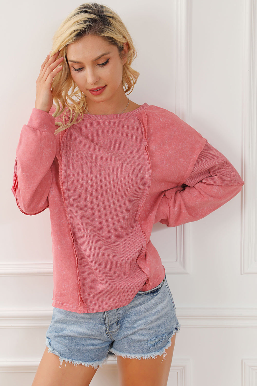 Rose Mineral Wash Patchwork Exposed Seam Sweatshirt featuring a retro design with exposed seams and a loose fit, made from fine terry fabric.