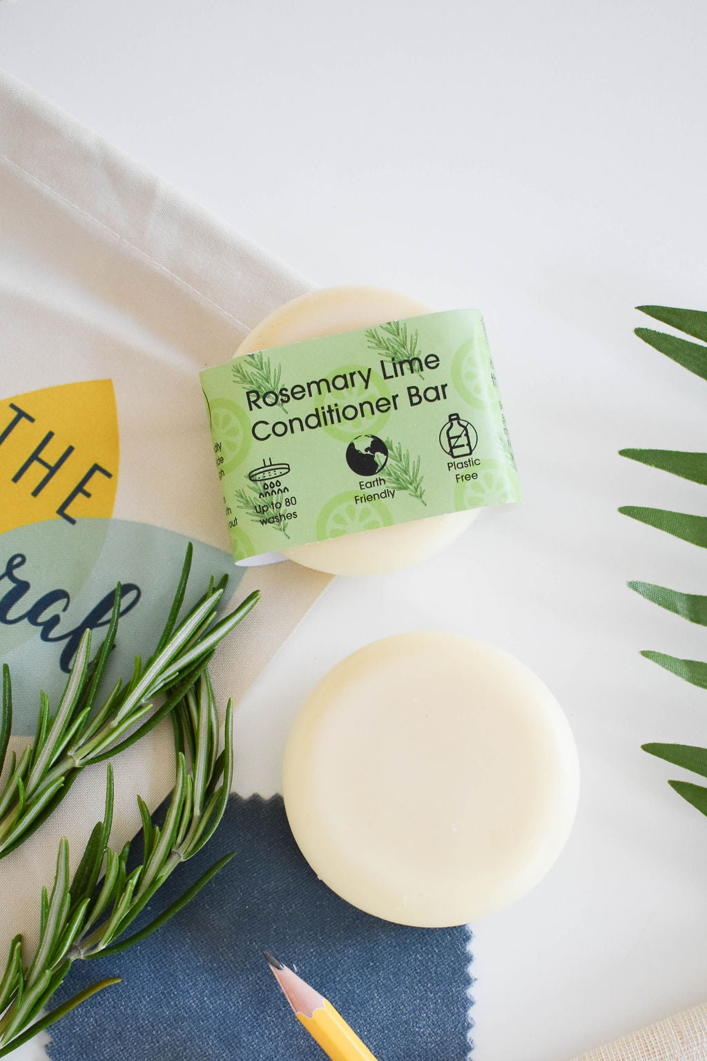 Rosemary and Lime Solid Conditioner bar, eco-friendly and plastic-free, featuring a unique design with natural ingredients.