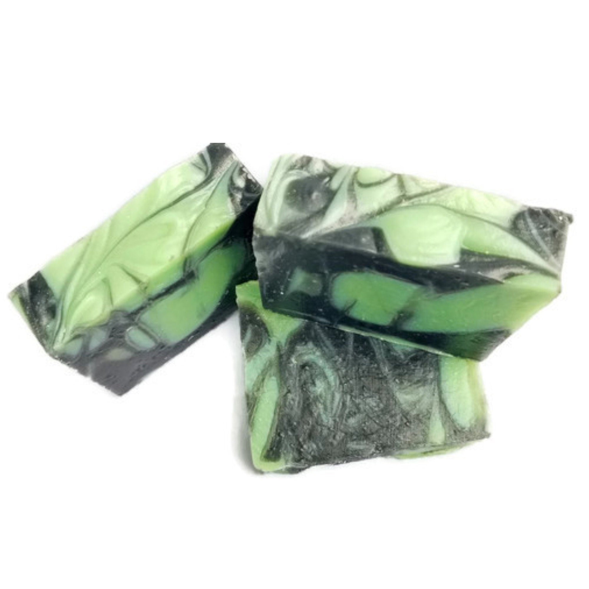 Rosemary Lime Soap bar with green clay and activated charcoal, wrapped and labeled, showcasing its natural ingredients and luxurious texture.