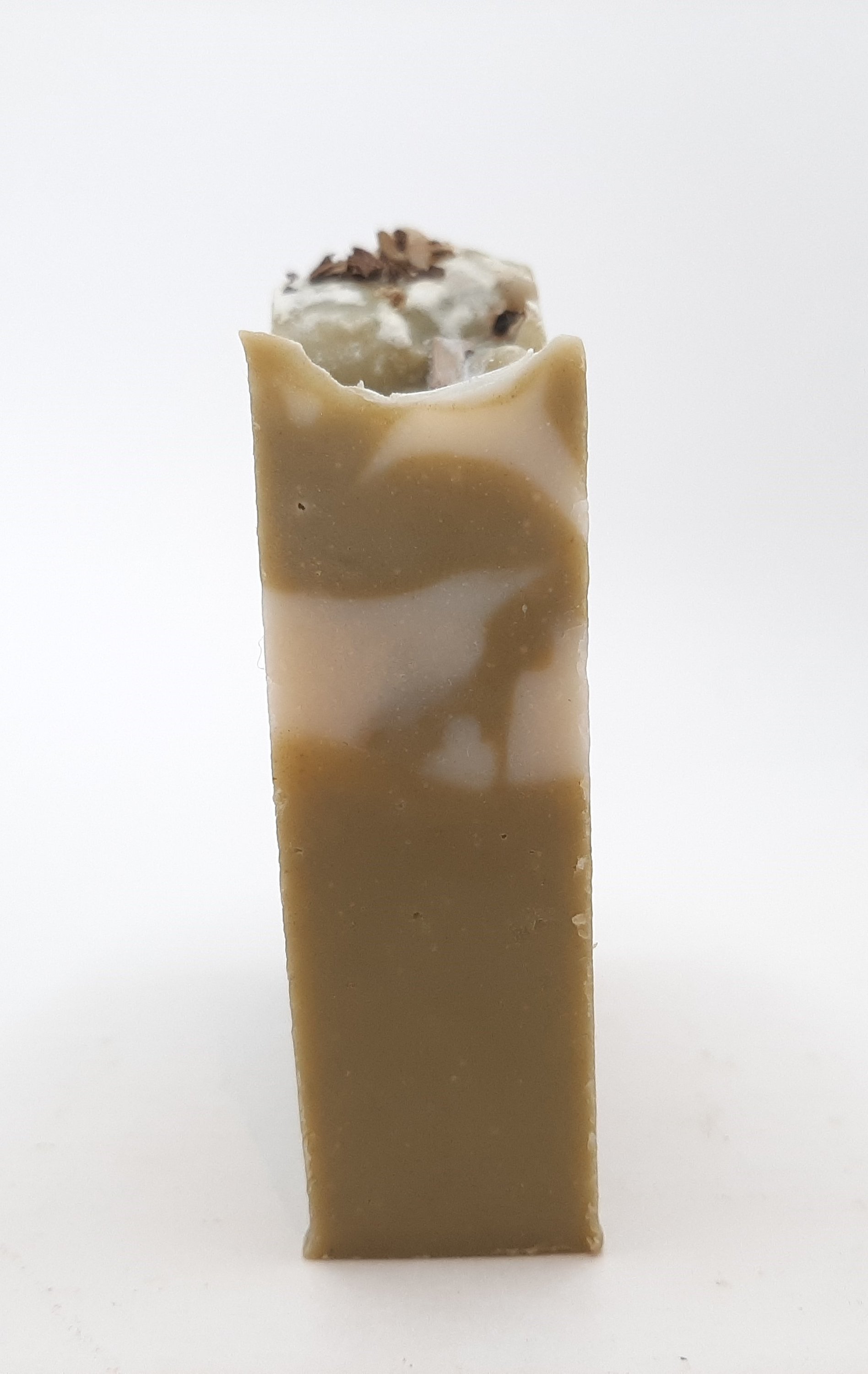 A beautifully crafted Rosemary & Mint Handmade Soap Bar, showcasing its natural colors and texture, perfect for refreshing skin care.