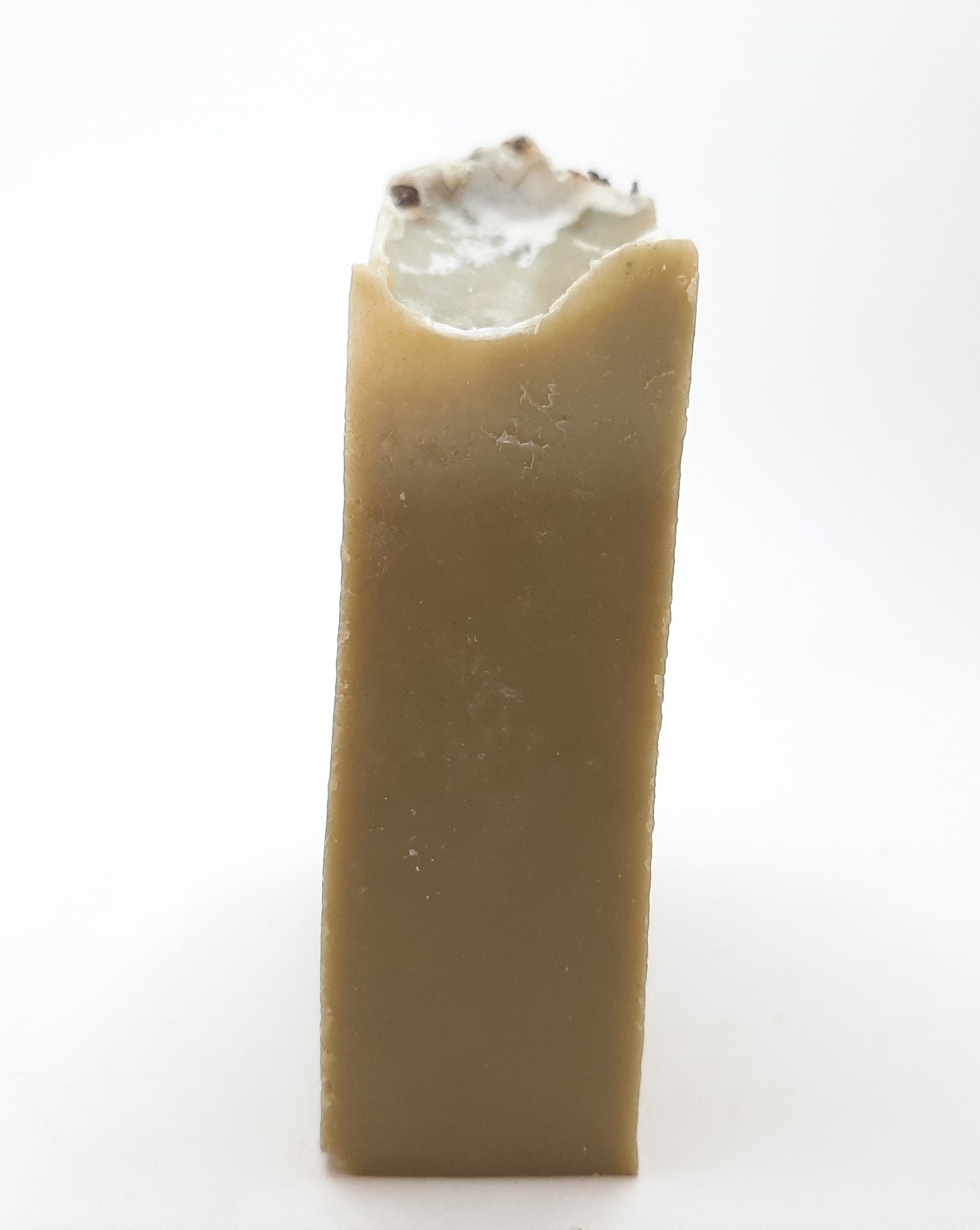 A beautifully crafted Rosemary & Mint Handmade Soap Bar, showcasing its natural colors and texture, perfect for refreshing skin care.