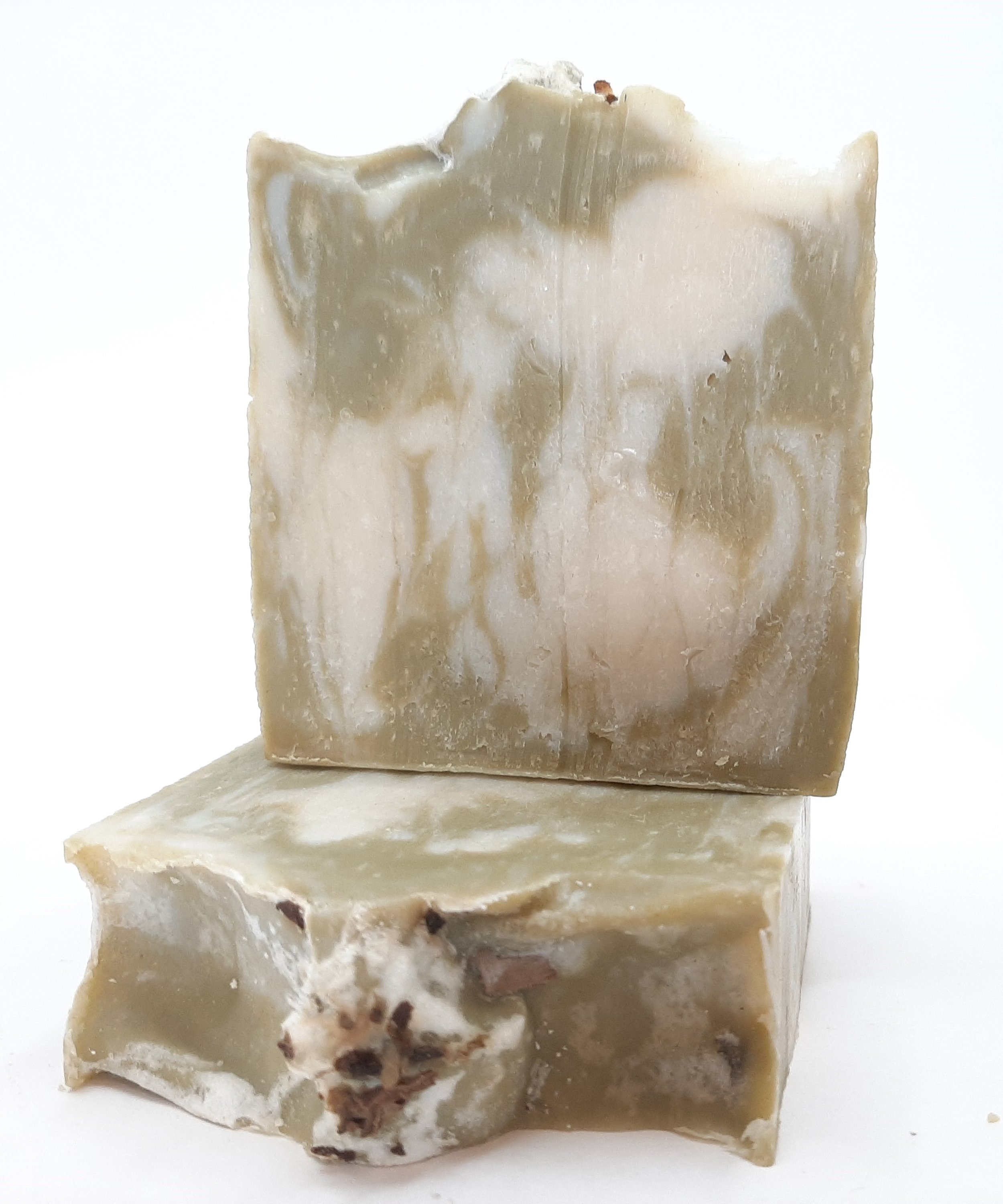 A beautifully crafted Rosemary & Mint Handmade Soap Bar, showcasing its natural colors and texture, perfect for refreshing skin care.