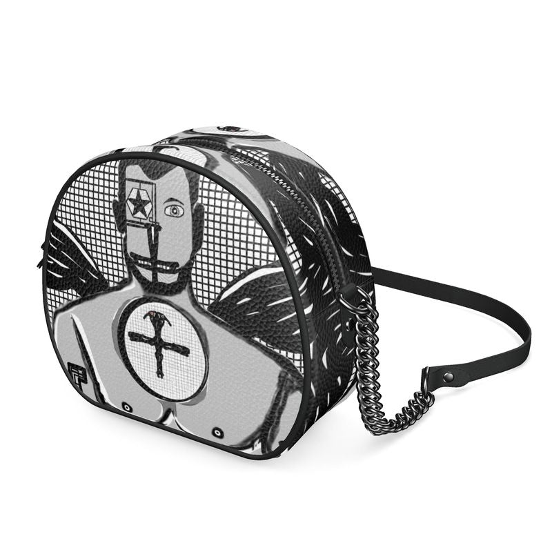 A stylish Round Box Bag made from 100% Nappa leather with faux suede lining and smooth black leather piping.