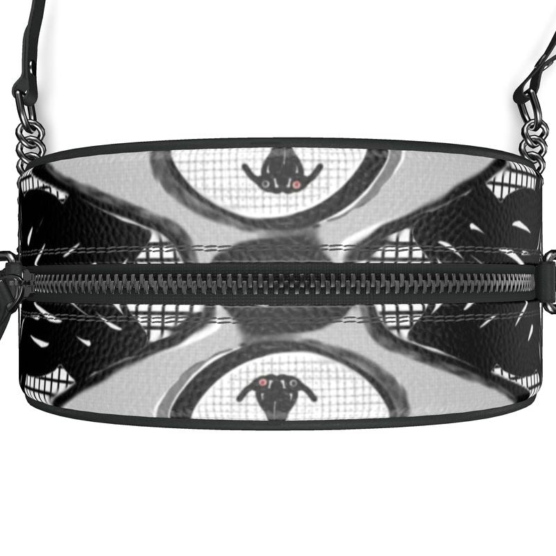 A stylish Round Box Bag made from 100% Nappa leather with faux suede lining and smooth black leather piping.