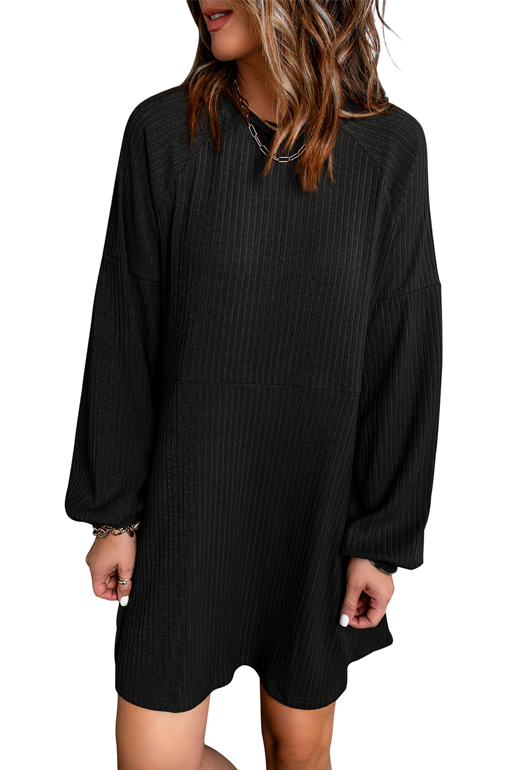 A stylish Round Neck Empire Waist Ribbed Knit Dress featuring a relaxed fit, ribbed texture, bubble sleeves, and side pockets.