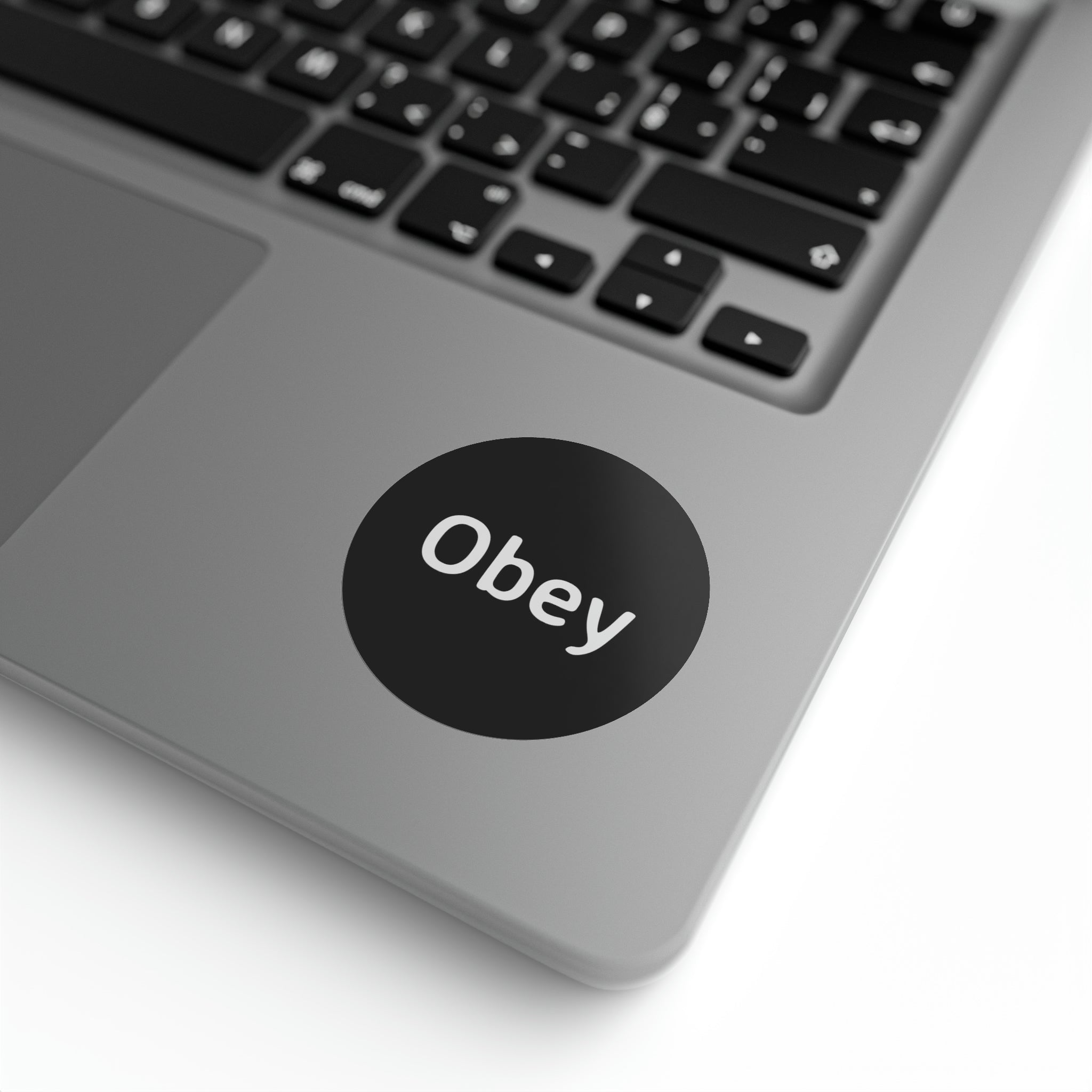 Round sticker label rolls in glossy finish, showcasing 1'' x 1'' and 2'' x 2'' sizes, made from durable BOPP material.