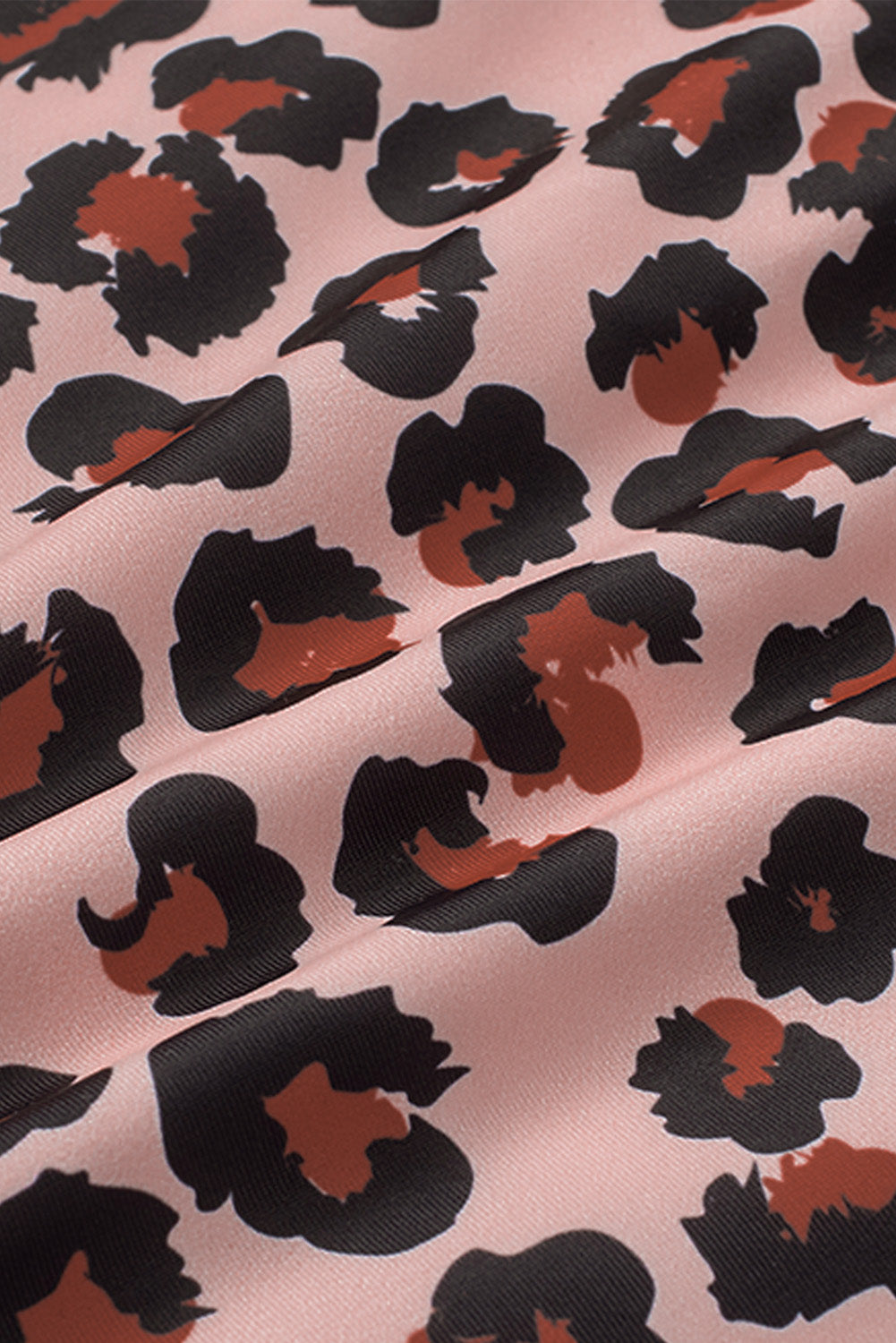 Ruffled Leopard Tankini Top paired with Solid Color Panty Swimwear, showcasing stylish design and comfortable fit for summer beach outings.