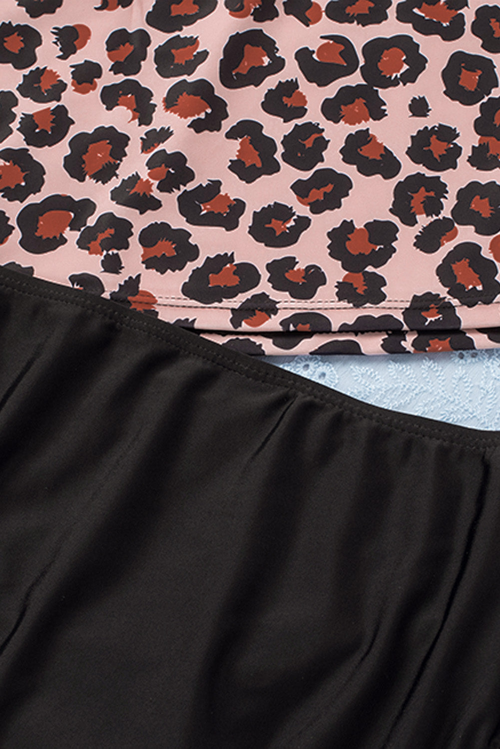 Ruffled Leopard Tankini Top paired with Solid Color Panty Swimwear, showcasing stylish design and comfortable fit for summer beach outings.