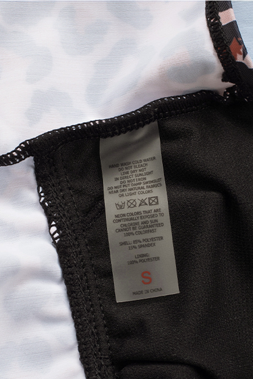 Ruffled Leopard Tankini Top paired with Solid Color Panty Swimwear, showcasing stylish design and comfortable fit for summer beach outings.