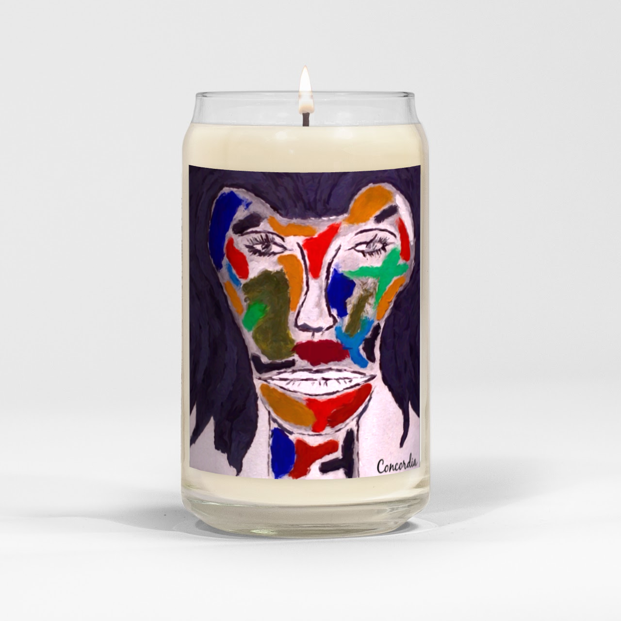 Salvador Dali Concordia Candle in a clear vessel, showcasing its elegant design and natural soy wax blend.