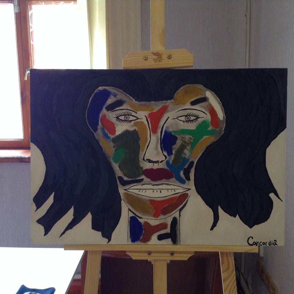 Salvador Dali Concordia Candle in a clear vessel, showcasing its elegant design and natural soy wax blend.