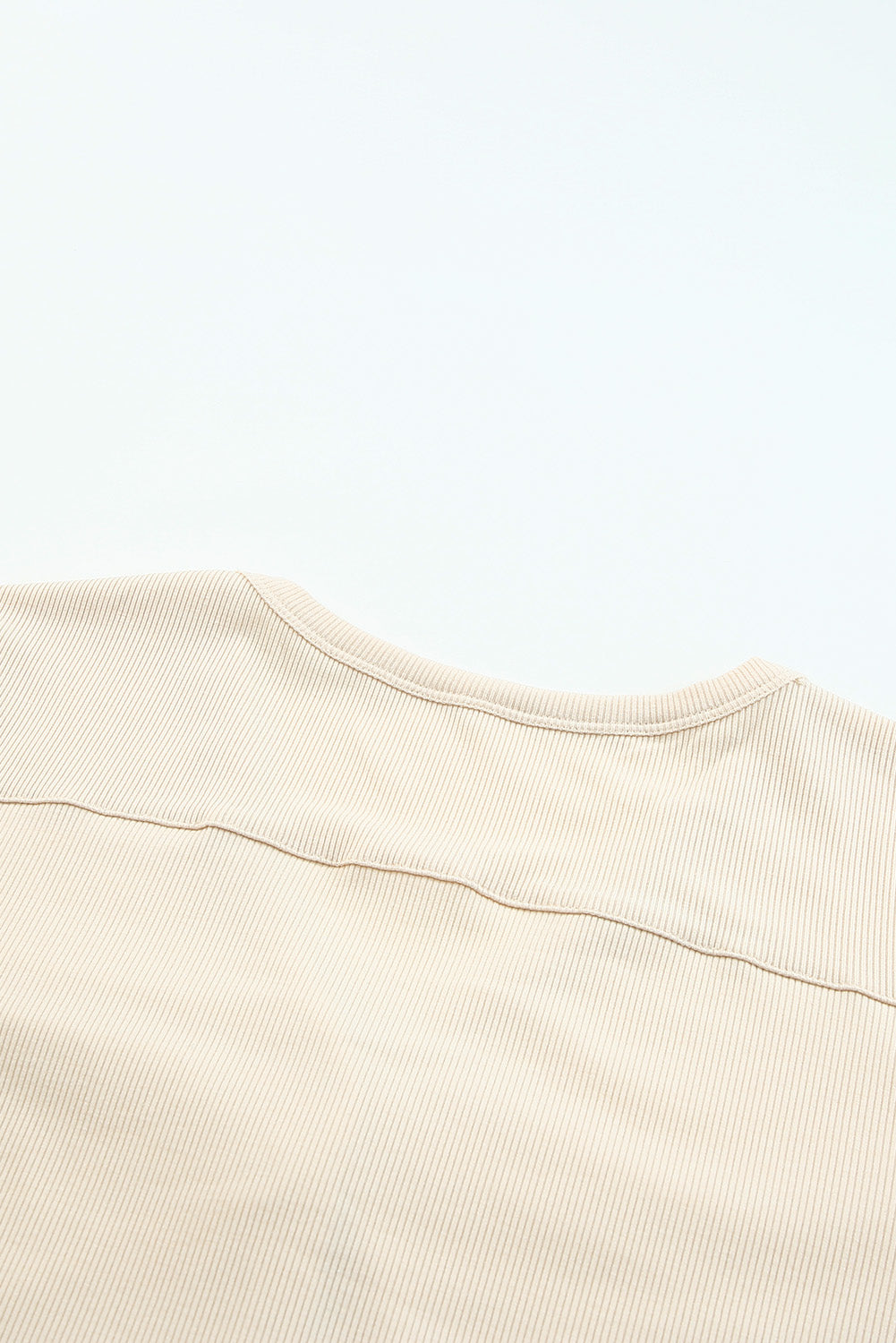 Selected Button Down Pocketed High Low Cardigan in a stylish design with button closure and side pockets, perfect for layering.