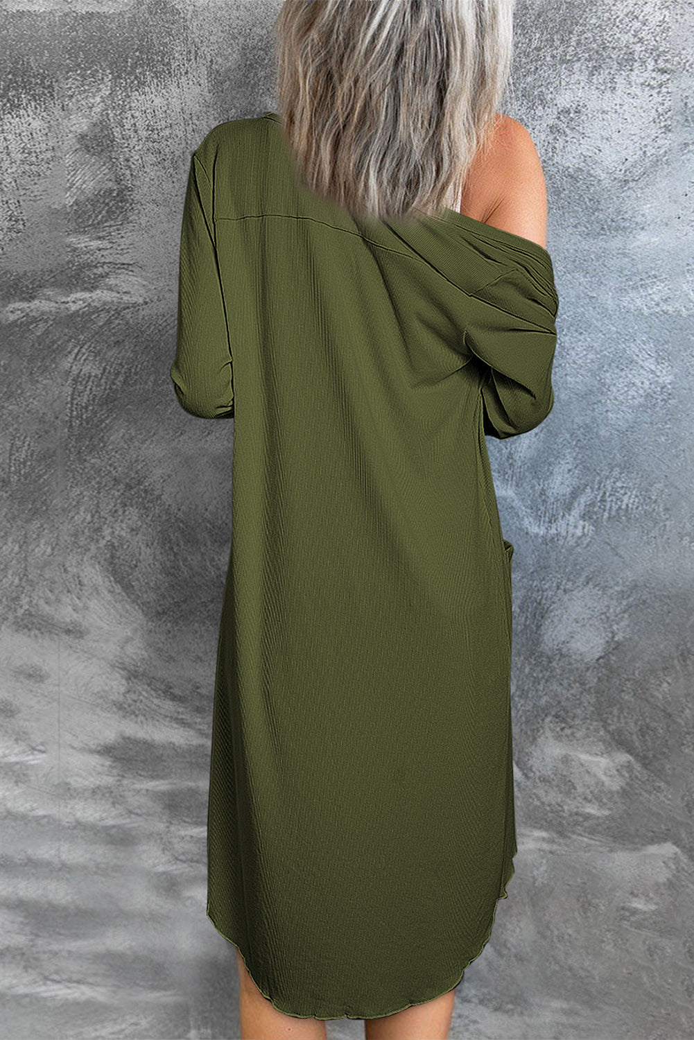 Selected Button Down Pocketed High Low Cardigan in a stylish design with button closure and side pockets, perfect for layering.