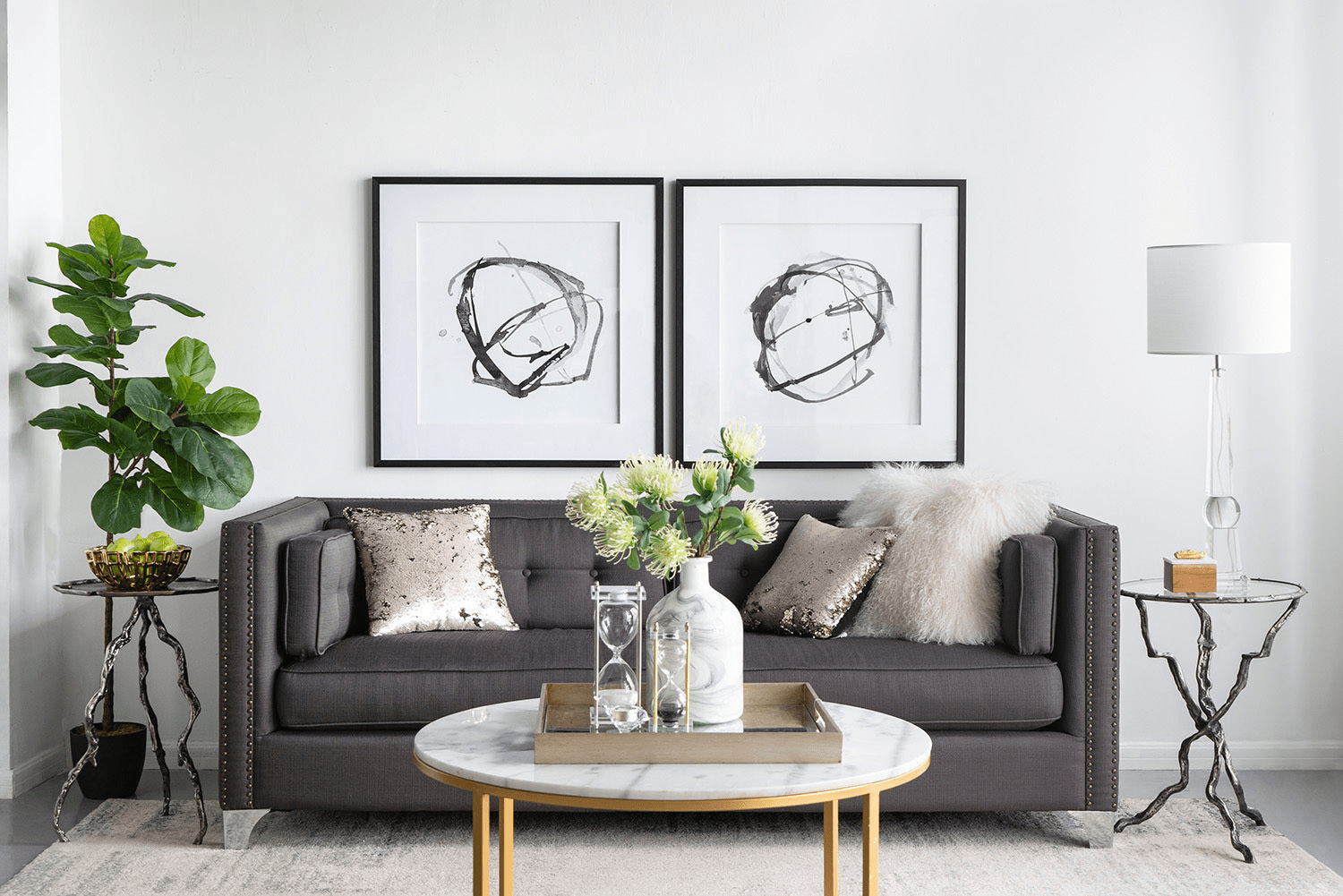 Set of 2 modern abstract wall art prints framed in black, featuring contrasting shades of gray and white, measuring 31.5 inches square.