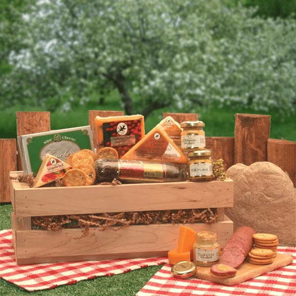 Signature Sausage & Cheese Crate featuring Swiss cheese, Wisconsin Cheddar, Jalapeno cheese, Bavarian Beef Salami, and assorted crackers in a wooden crate.