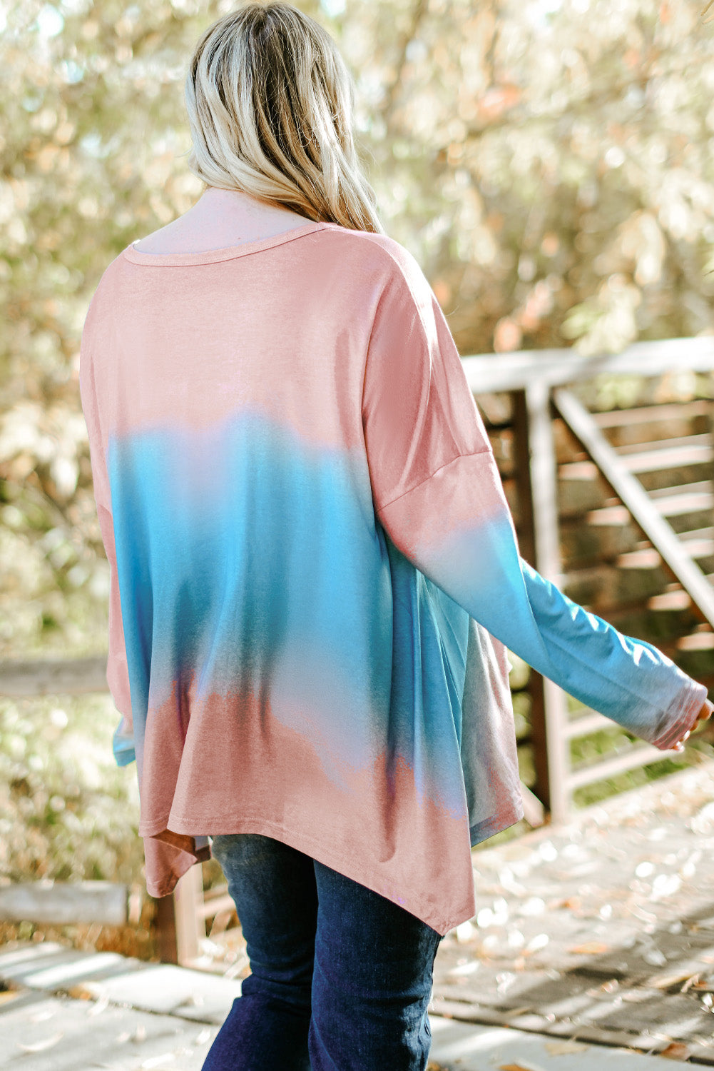 Sky Blue Plus Size Painted Poncho Top featuring a unique tie-dye print, round neck, drop shoulder, and long sleeves, designed for comfort and style.