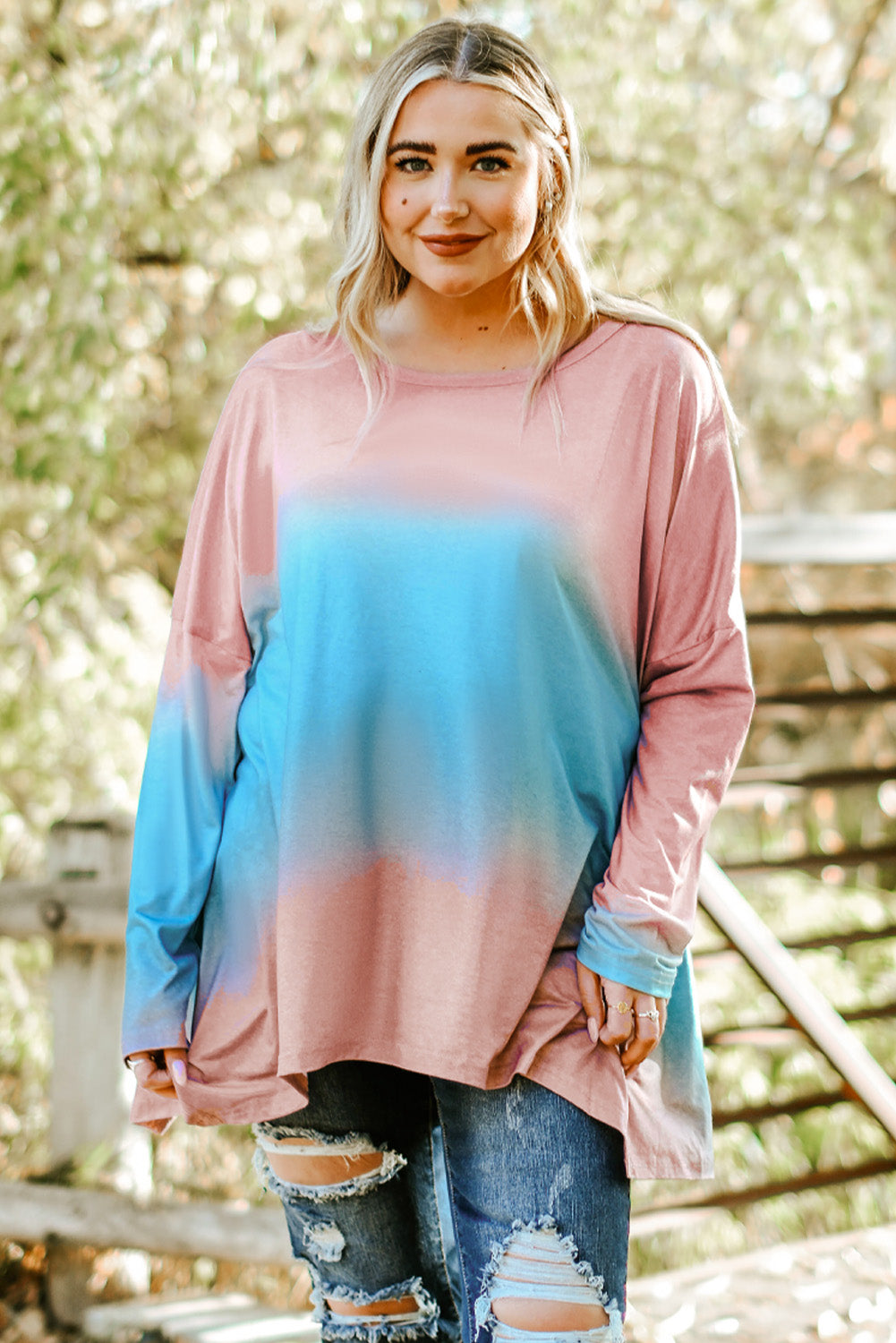 Sky Blue Plus Size Painted Poncho Top featuring a unique tie-dye print, round neck, drop shoulder, and long sleeves, designed for comfort and style.