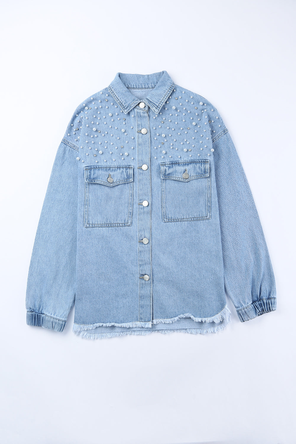 Sky blue denim shacket embellished with rhinestones and pearls, featuring a raw hemline and flap pockets.