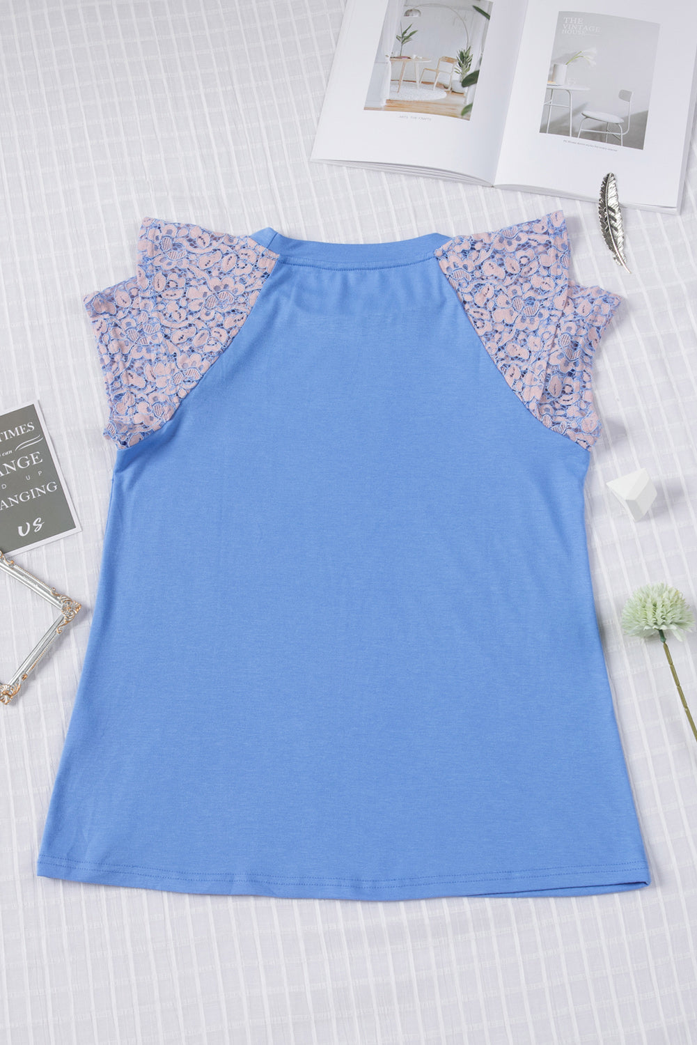 Sky Blue Tiered Lace Sleeve Knit Top featuring elegant lace splicing and a comfortable crew neck design.