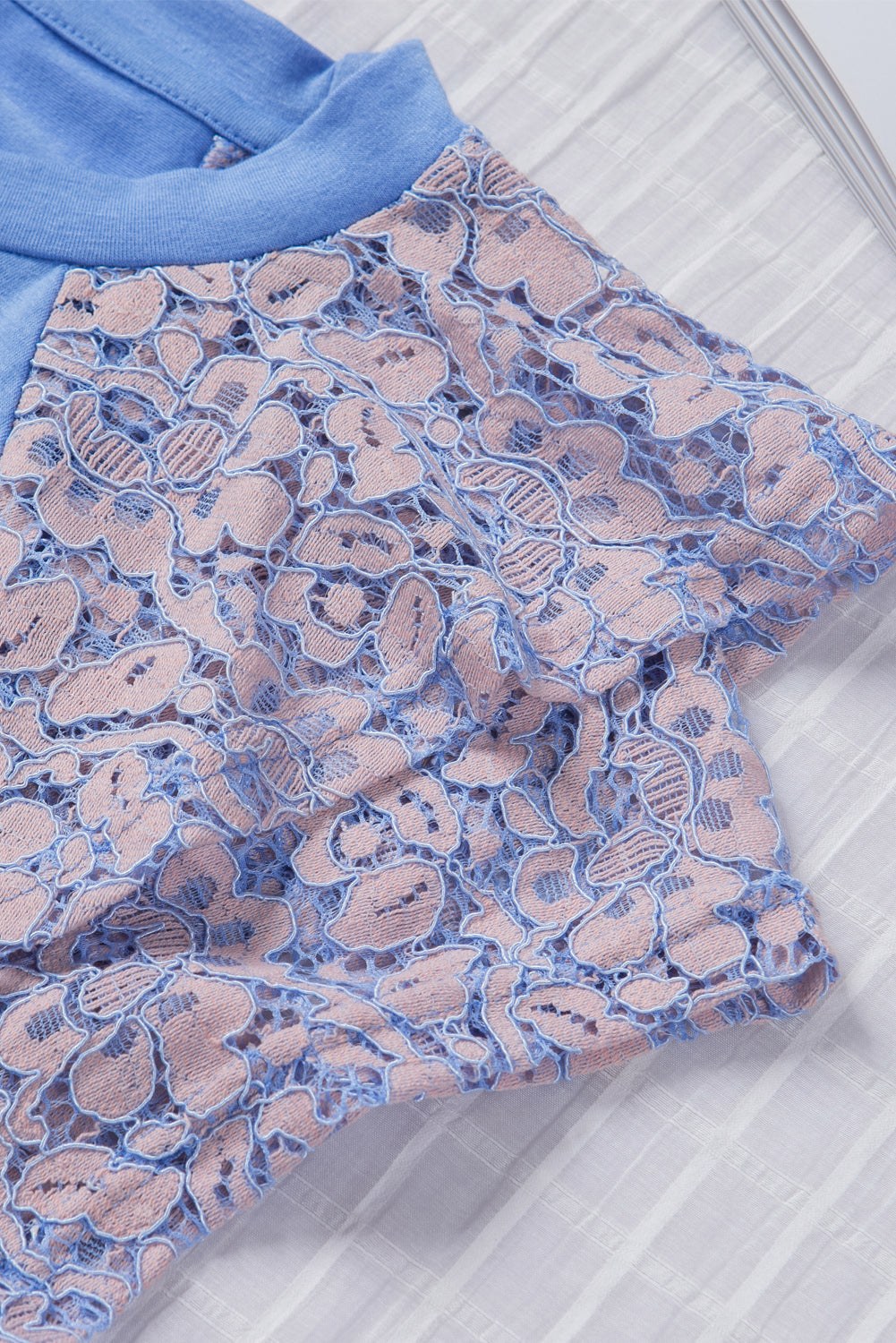 Sky Blue Tiered Lace Sleeve Knit Top featuring elegant lace splicing and a comfortable crew neck design.