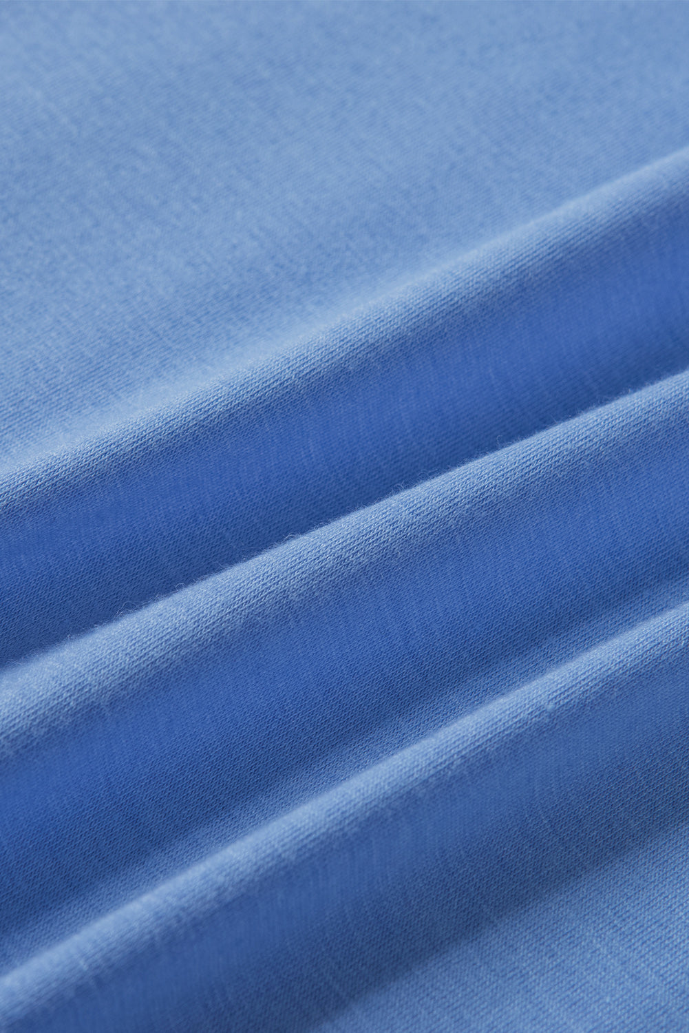 Sky Blue Tiered Lace Sleeve Knit Top featuring elegant lace splicing and a comfortable crew neck design.