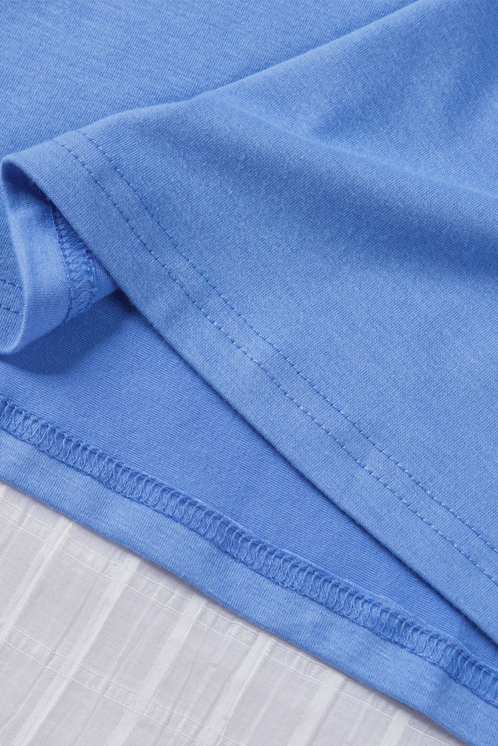 Sky Blue Tiered Lace Sleeve Knit Top featuring elegant lace splicing and a comfortable crew neck design.