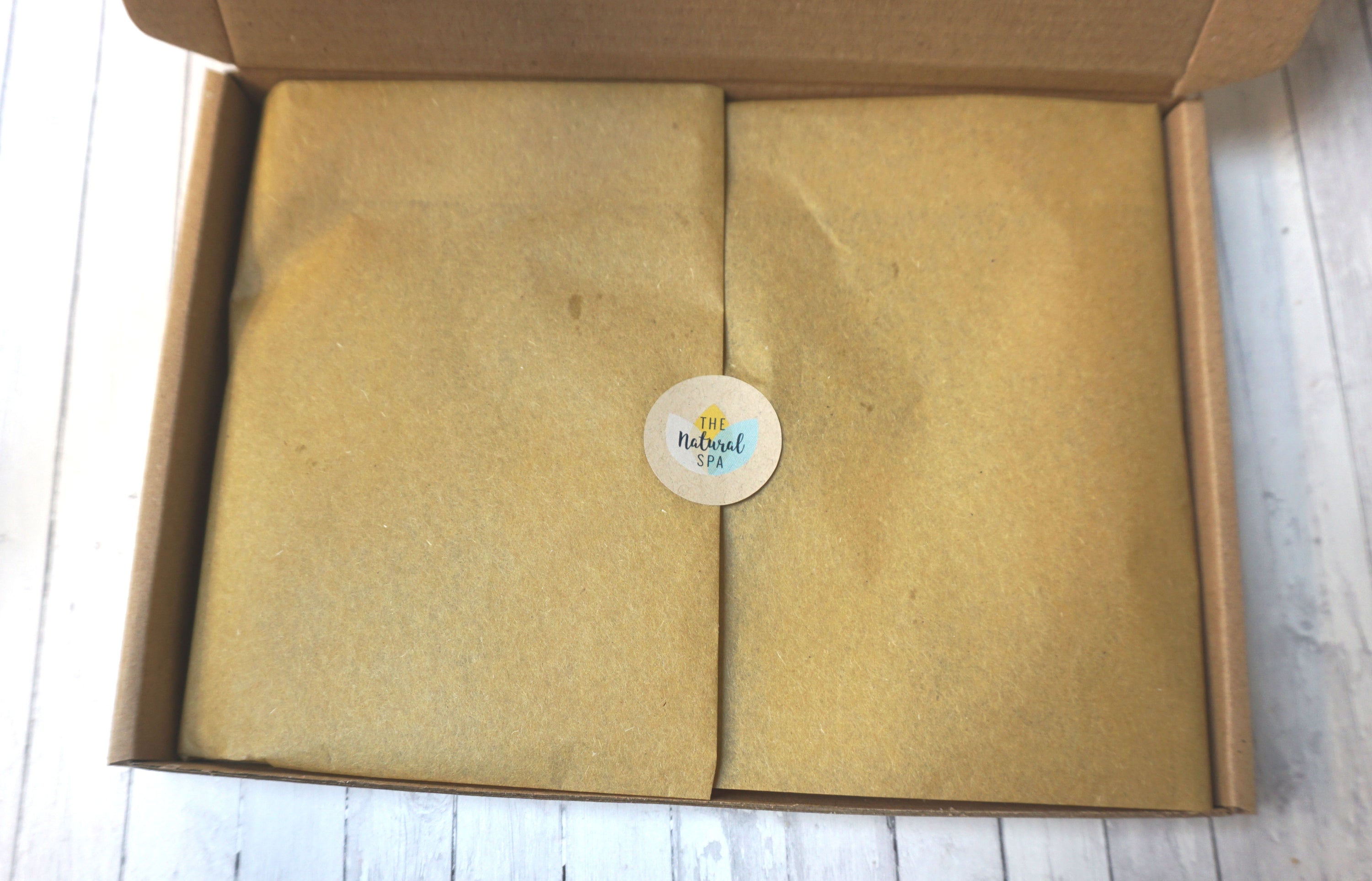 Soap Sampler Gift Set featuring 8 mini travel soaps in a letterbox-sized package, showcasing various colors and textures.