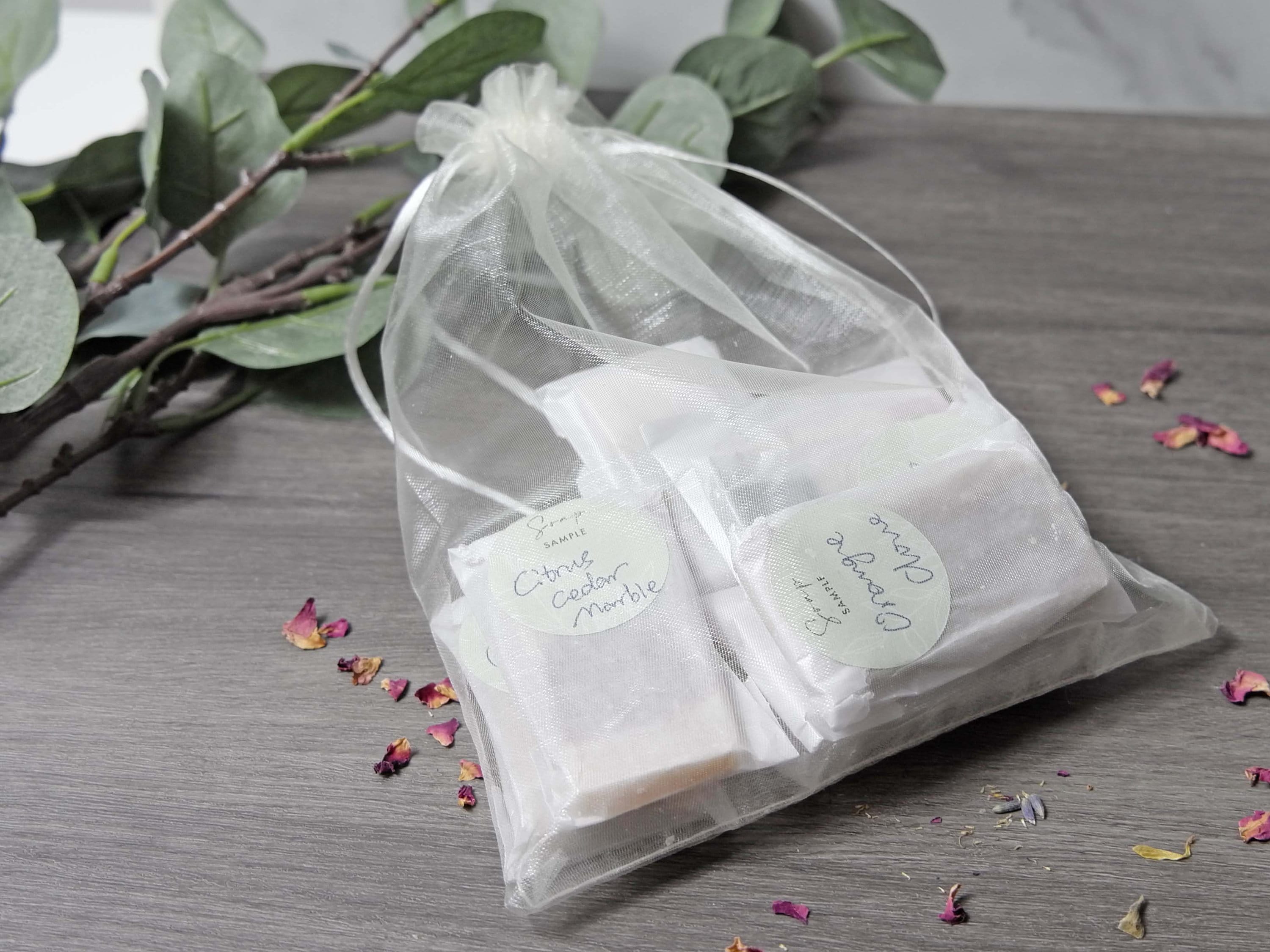 A collection of assorted soap samples in various scents, each approximately 0.5 oz, displayed attractively for potential buyers.