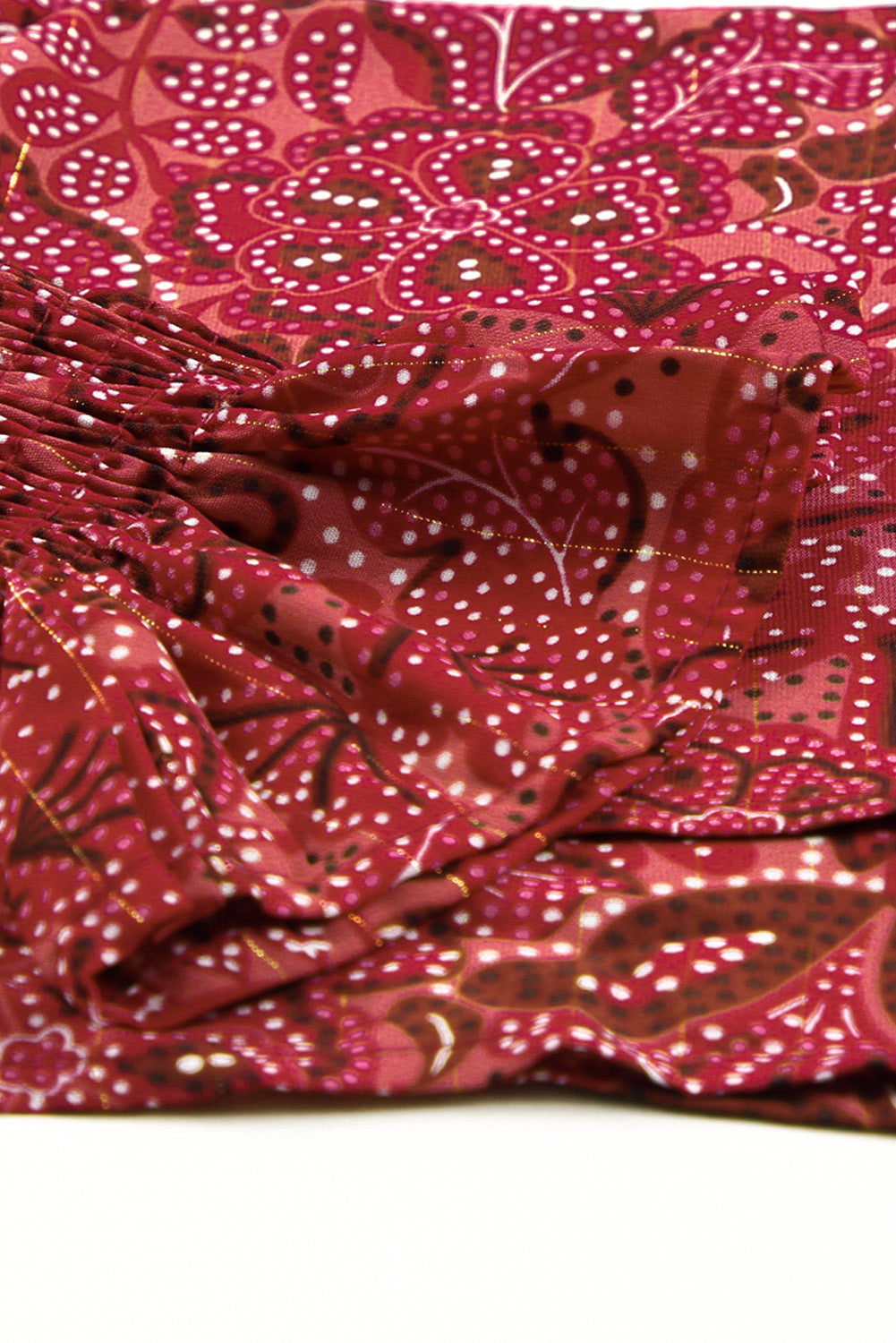 A stylish Square Neck Floral Crop Blouse featuring a square neckline, ruffled puff sleeves, and a vibrant floral print, perfect for chic outfits.