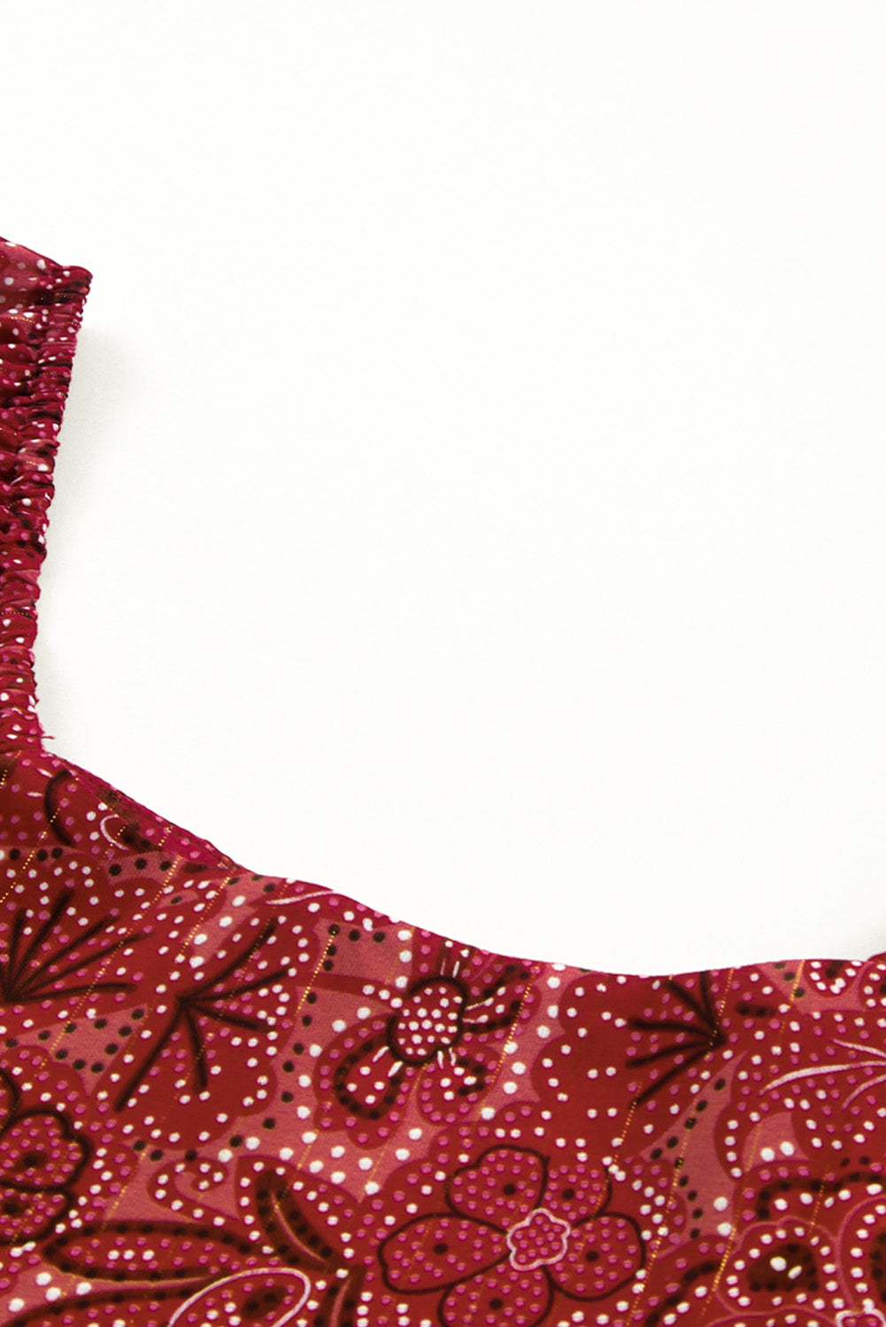 A stylish Square Neck Floral Crop Blouse featuring a square neckline, ruffled puff sleeves, and a vibrant floral print, perfect for chic outfits.