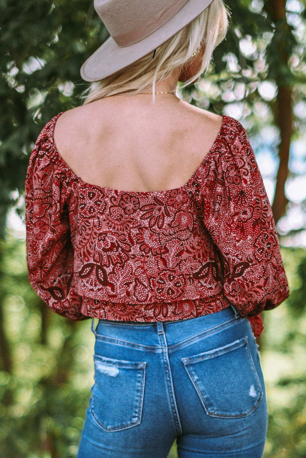 A stylish Square Neck Floral Crop Blouse featuring a square neckline, ruffled puff sleeves, and a vibrant floral print, perfect for chic outfits.