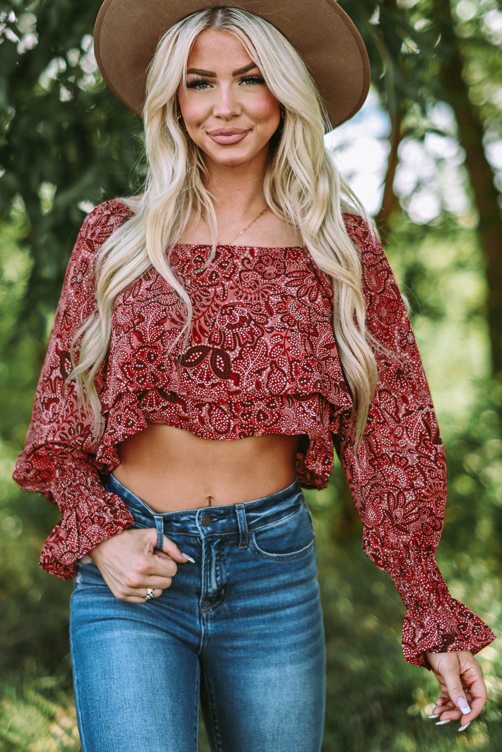 A stylish Square Neck Floral Crop Blouse featuring a square neckline, ruffled puff sleeves, and a vibrant floral print, perfect for chic outfits.