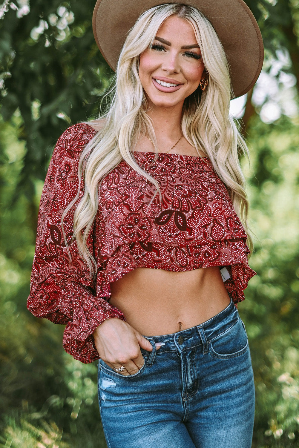 A stylish Square Neck Floral Crop Blouse featuring a square neckline, ruffled puff sleeves, and a vibrant floral print, perfect for chic outfits.