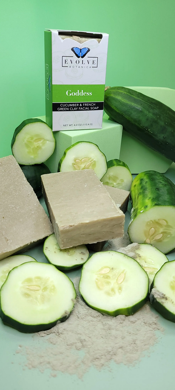 Goddess Cucumber & French Green Clay Facial Soap bar with natural ingredients, showcasing its creamy texture and fresh cucumber slices.