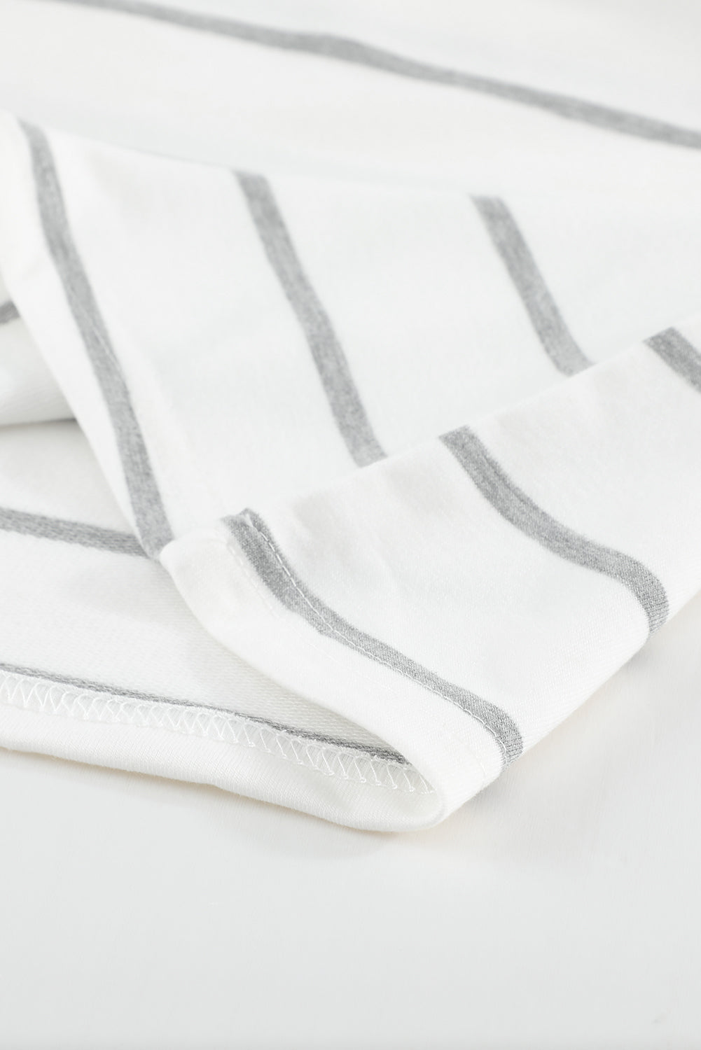 A stylish plus size floral long sleeve top featuring a stripe print design, perfect for casual and formal occasions.