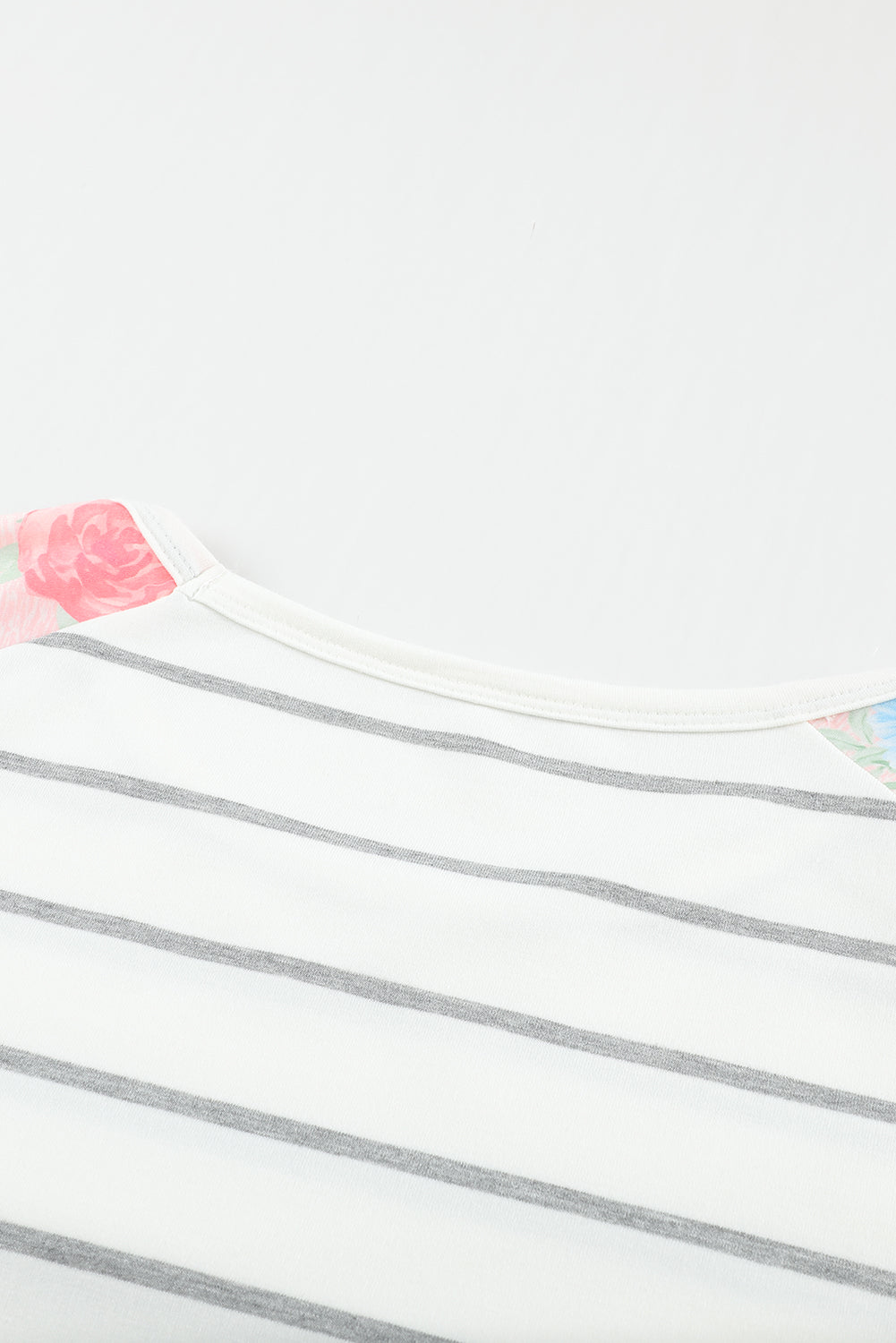 A stylish plus size floral long sleeve top featuring a stripe print design, perfect for casual and formal occasions.