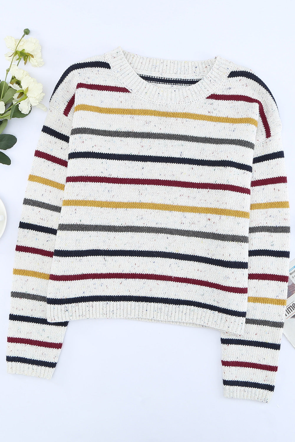 A stylish heathery grey knit sweater featuring colorful stripes, crew neck, and long drop sleeves, perfect for chilly weather.