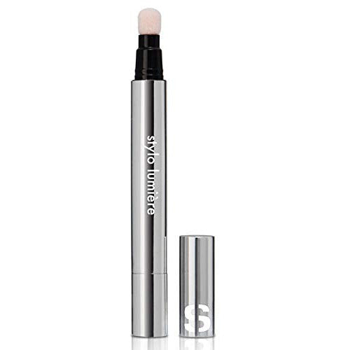 Sisley Stylo Lumière Concealer 2.5ml in shade 04 Golden Beige, showcasing its sleek packaging and creamy texture.