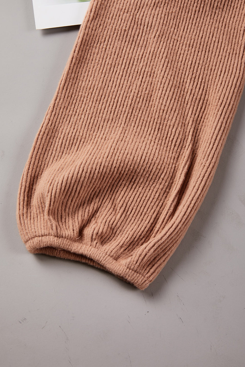 Surplice Ribbed Bubble Sleeve Crop Top featuring a flattering faux wrap design, long bubble sleeves, and a stylish ribbed fabric.