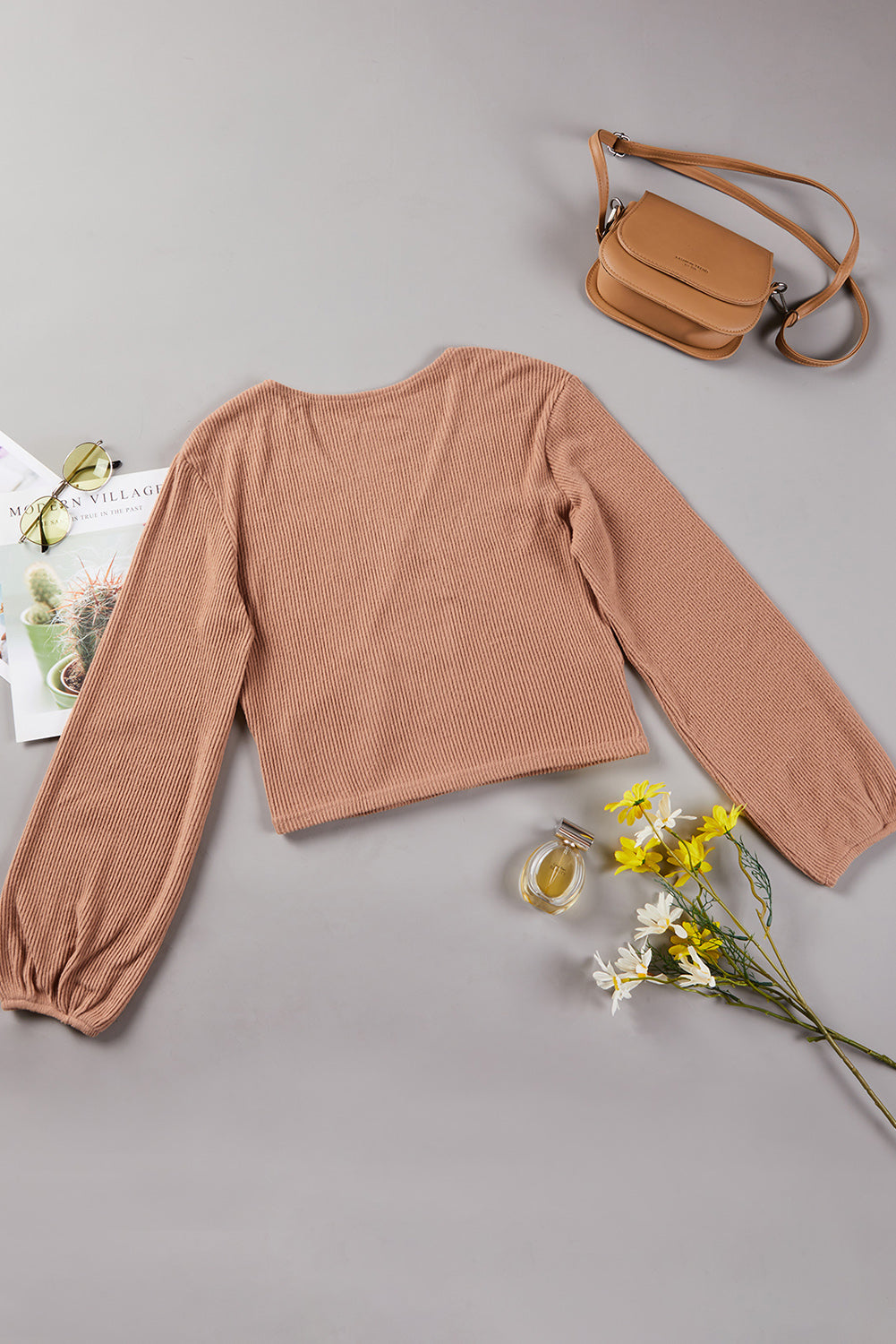 Surplice Ribbed Bubble Sleeve Crop Top featuring a flattering faux wrap design, long bubble sleeves, and a stylish ribbed fabric.