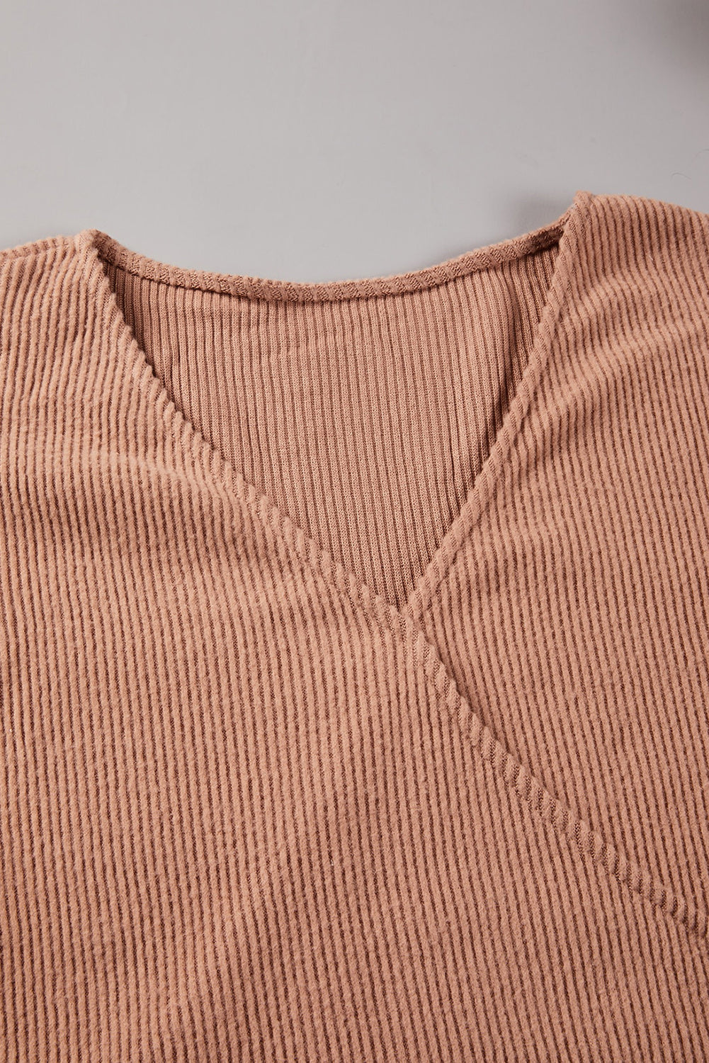 Surplice Ribbed Bubble Sleeve Crop Top featuring a flattering faux wrap design, long bubble sleeves, and a stylish ribbed fabric.