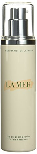 Crème De La Mer The Cleansing Lotion in a sleek bottle, showcasing its luxurious design and creamy texture.