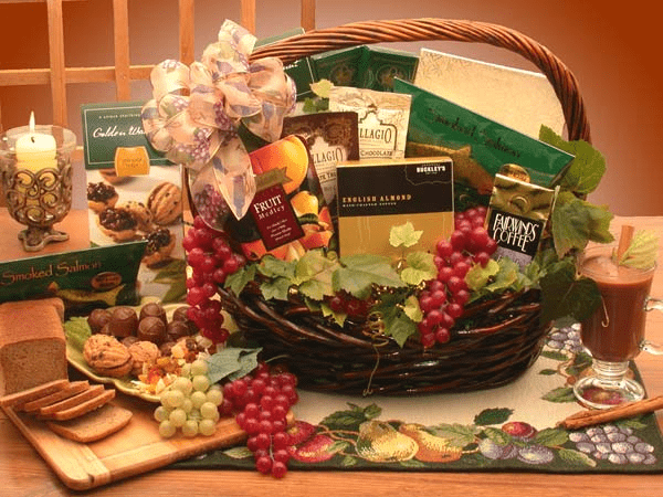 A beautifully arranged Kosher Gourmet Gift Basket featuring assorted kosher sweets, treats, and a dark stained basket.