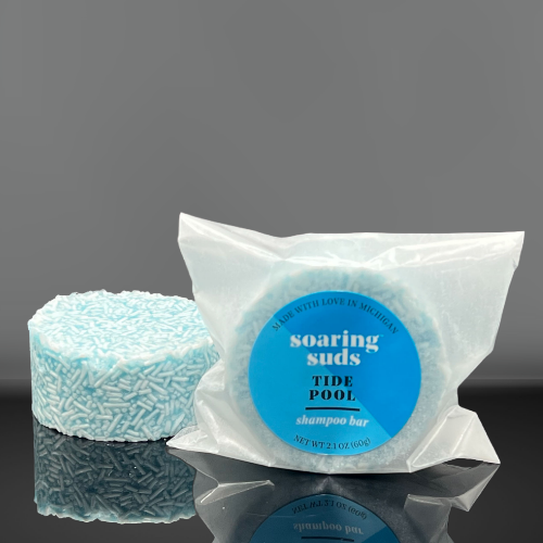 Tide Pool Shampoo & Conditioner bars with spearmint, sage, and eucalyptus scent, showcasing their eco-friendly packaging and moisturizing ingredients.