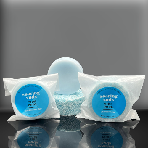 Tide Pool Shampoo & Conditioner bars with spearmint, sage, and eucalyptus scent, showcasing their eco-friendly packaging and moisturizing ingredients.